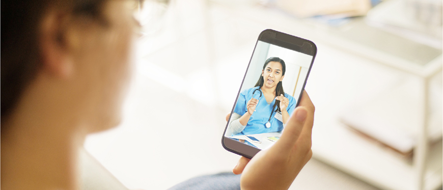 Patient using smartphone for video call with a provider