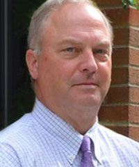 John R. Brumsted, MD