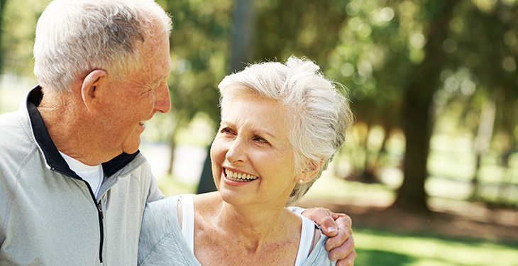 Older couple smiling at each other